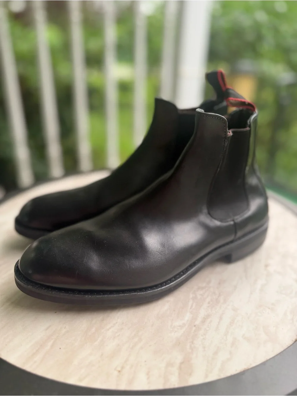 Allen Edmonds Black Leather Nomad Chelsea Boots with Red Heel Pull